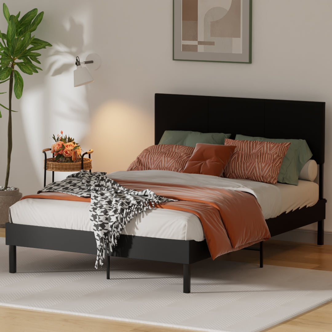 Sonnewelt upholstered bed frame with leather headboard